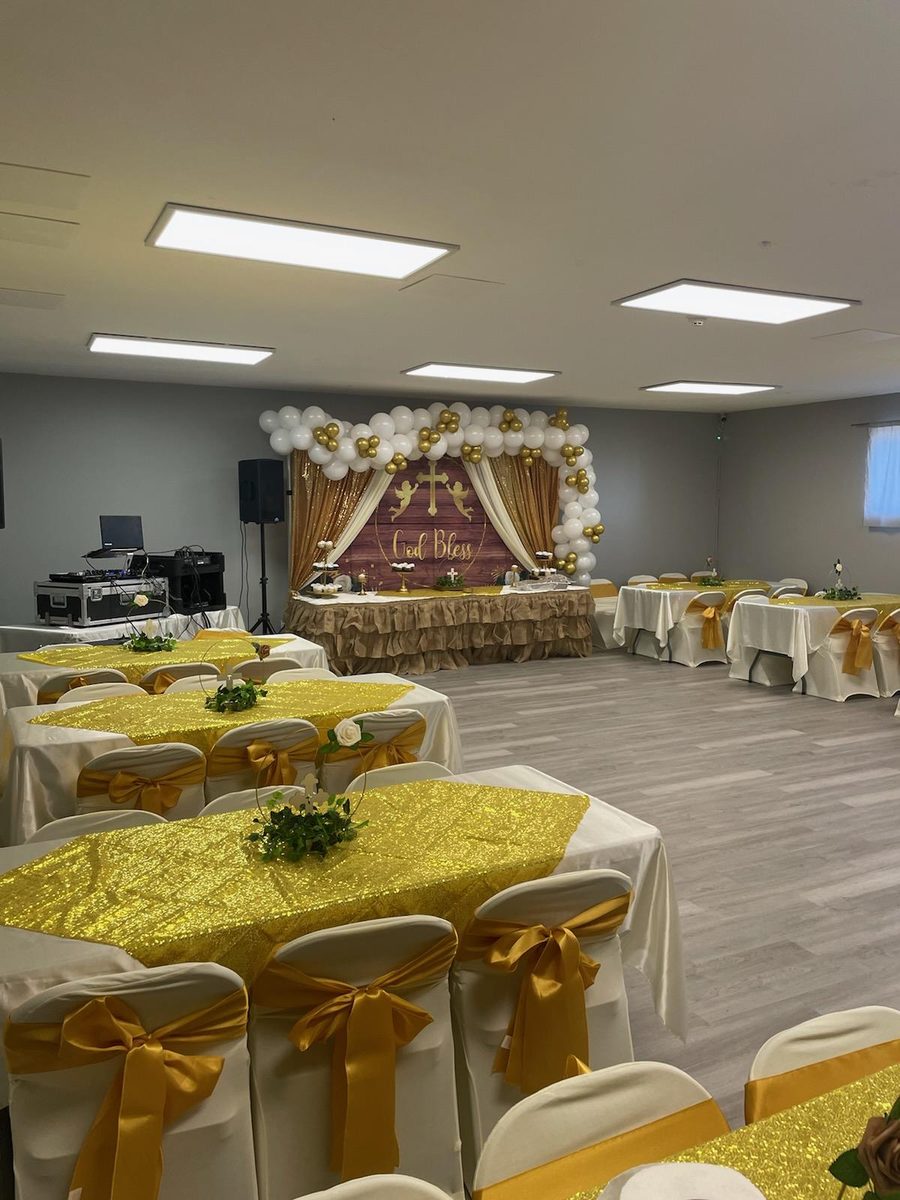 Gold and white celebration setup at Infinity Venue