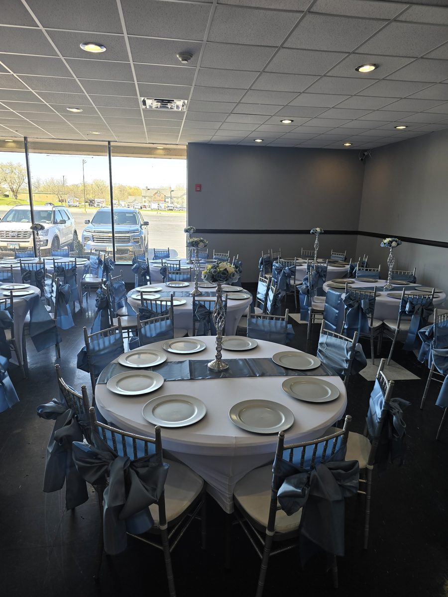 Reception tables in dusty blue at Infinity Venue